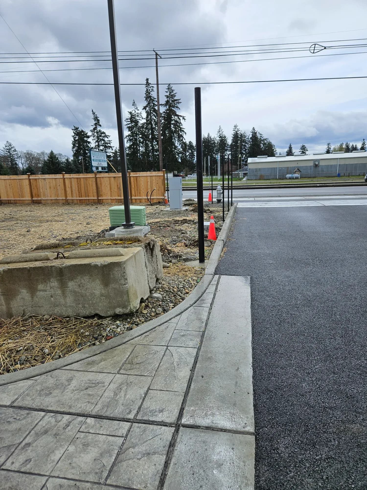 Commercial fence installation under construction in Federal Way